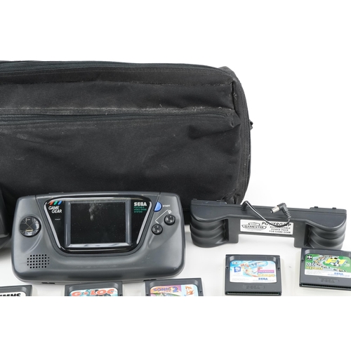 2063 - Sega Game Gear hand held games console with a collection of games model 2110-50