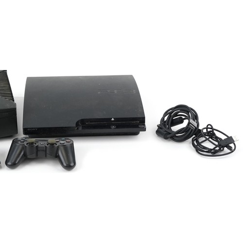 2069 - Xbox games console and Sony PlayStation 3 games console with controllers