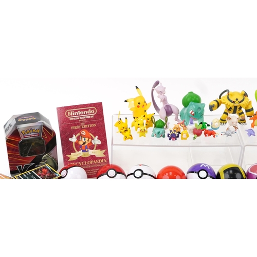 2027 - Pokémon collectables including a large collection of trade cards, some holographic, PokéBalls and co... 