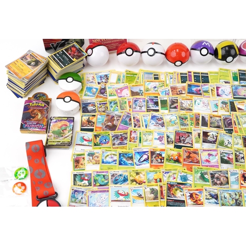 2027 - Pokémon collectables including a large collection of trade cards, some holographic, PokéBalls and co... 