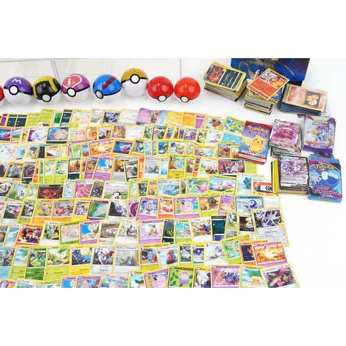 2027 - Pokémon collectables including a large collection of trade cards, some holographic, PokéBalls and co... 