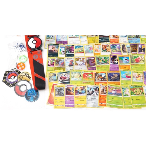 2027 - Pokémon collectables including a large collection of trade cards, some holographic, PokéBalls and co... 