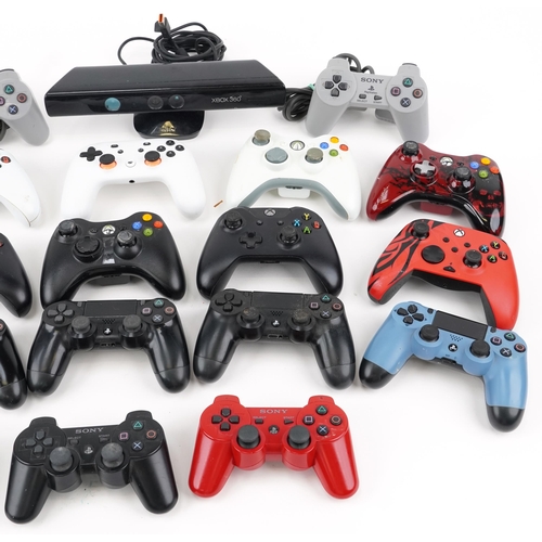 2071 - Collection of PlayStation and Xbox controllers and an Xbox 360 Kinect