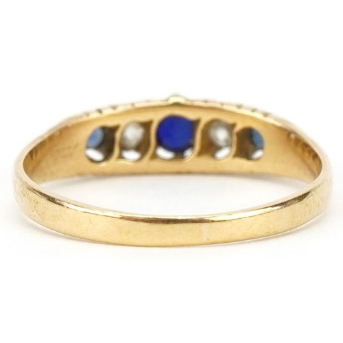 3299 - 18ct gold diamond and blue spinel five stone ring, each diamond approximately 2.5mm in diameter x 1.... 