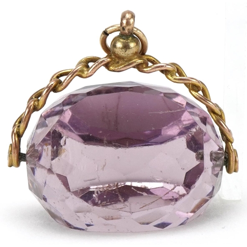 3073 - Large 9ct rose gold facet cut amethyst spinner fob, 2.8cm wide, 12.0g