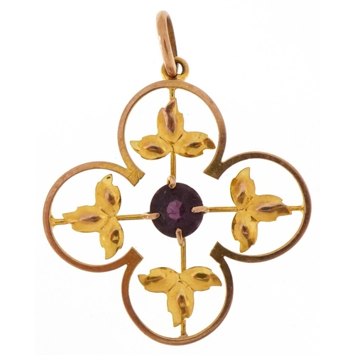 3042 - Edwardian 9ct gold openwork pendant set with purple solitaire stone, 2.8cm high, 1.8g