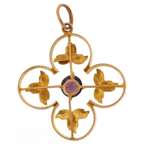 3042 - Edwardian 9ct gold openwork pendant set with purple solitaire stone, 2.8cm high, 1.8g