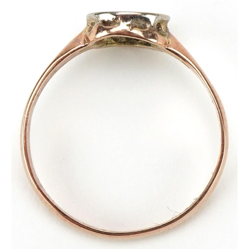 3253 - George V 9ct rose gold diamond solitaire ring, the diamond approximately 0.06 carat, size O, 1.8g