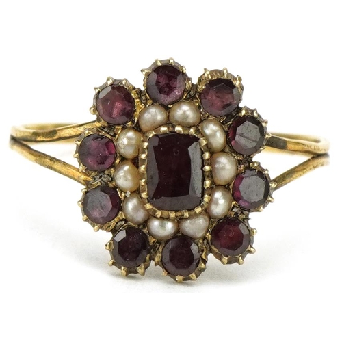 3022 - Antique unmarked gold garnet and seed pearl cluster ring, size L/M, 1.3g