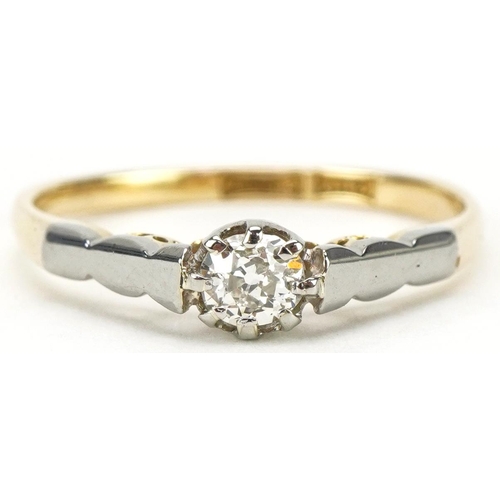 3060 - 18ct gold and platinum diamond solitaire ring, the diamond approximately 0.18 carat, size M, 1.8g