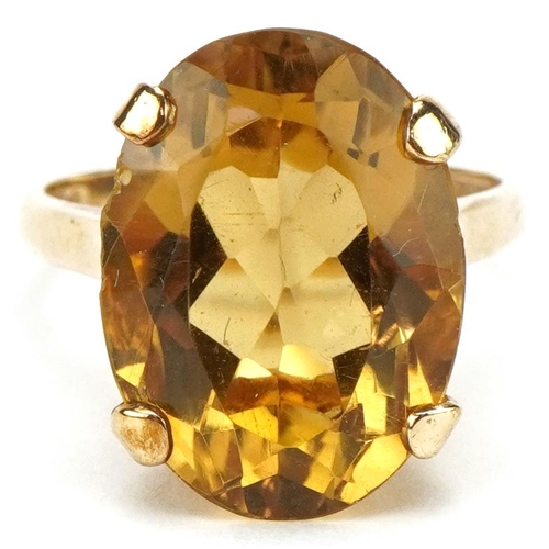 3030 - Large 9ct gold citrine ring, the citrine approximately 17.60mm x 12.90mm x 8.80mm deep, size O, 5.6g