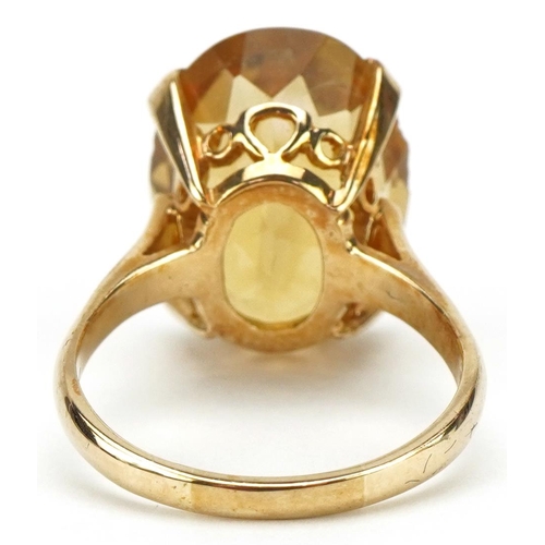 3030 - Large 9ct gold citrine ring, the citrine approximately 17.60mm x 12.90mm x 8.80mm deep, size O, 5.6g