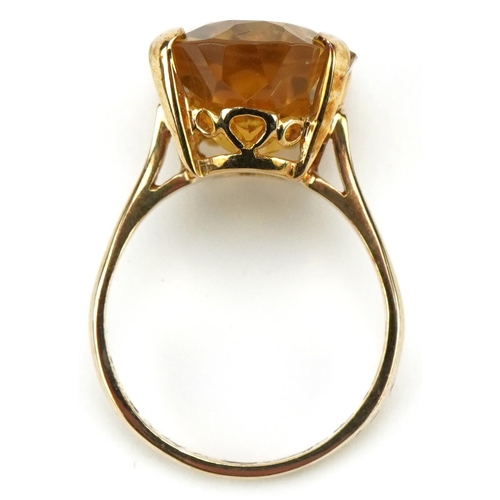 3030 - Large 9ct gold citrine ring, the citrine approximately 17.60mm x 12.90mm x 8.80mm deep, size O, 5.6g