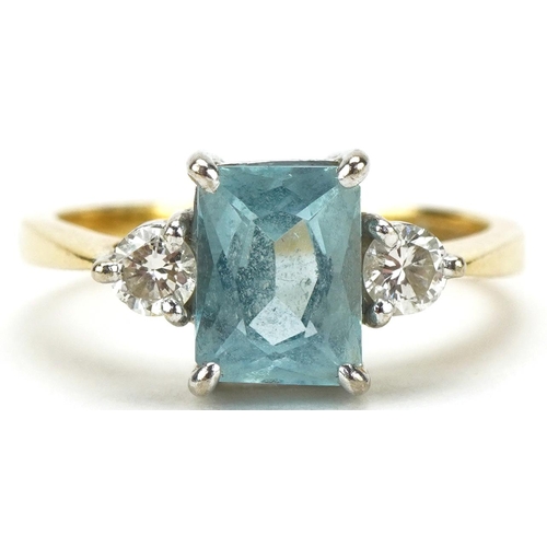 3002 - 18ct gold aquamarine and diamond three stone ring, the aquamarine approximately 7.65mm x 5.70mm x 4.... 