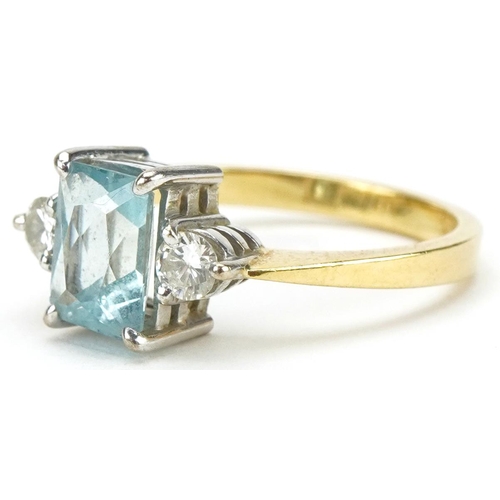 3002 - 18ct gold aquamarine and diamond three stone ring, the aquamarine approximately 7.65mm x 5.70mm x 4.... 