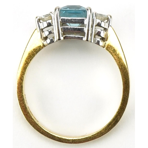 3002 - 18ct gold aquamarine and diamond three stone ring, the aquamarine approximately 7.65mm x 5.70mm x 4.... 