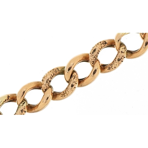 3025 - 9ct rose gold bracelet with floral engraved links, 16cm in length, 5.7g