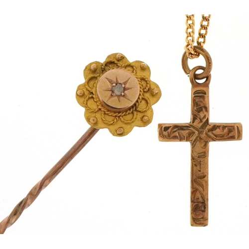 3225 - 9ct gold cross pendant on a 9ct gold necklace and a Victorian yellow metal stickpin set with a diamo... 