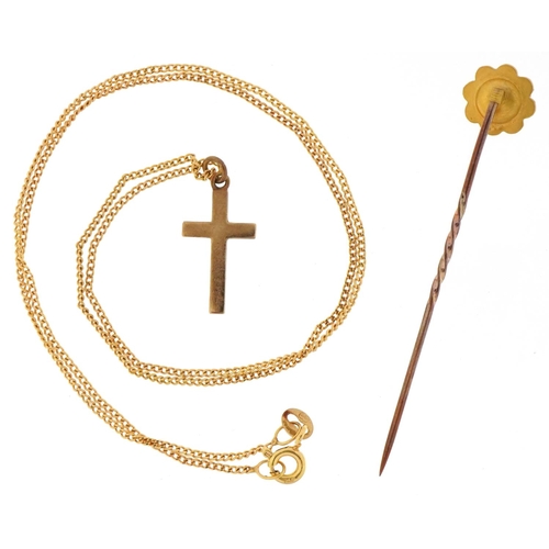 3225 - 9ct gold cross pendant on a 9ct gold necklace and a Victorian yellow metal stickpin set with a diamo... 