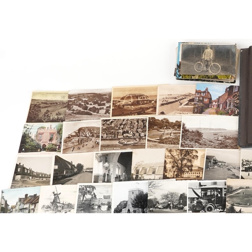 2439 - Collection of approximately two hundred postcards of Sussex including photographic, picture and repr... 