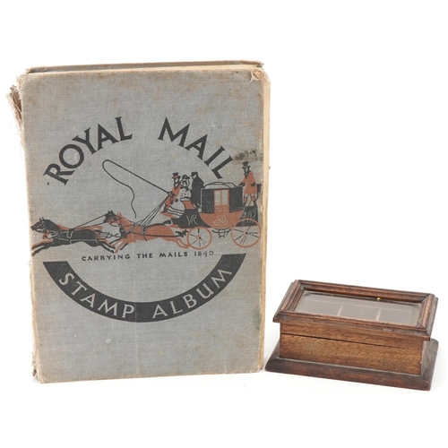 2272 - The Royal Mail stamp album for The Stamps of the World with a glazed stamp box, 11cm wide