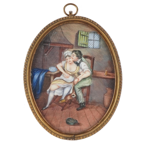 360 - Late 18th century oval watercolour miniature of a couple embracing within a gilt metal frame, 9cm x ... 