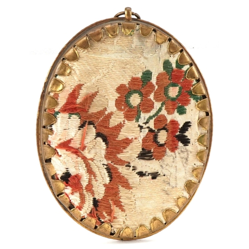 360 - Late 18th century oval watercolour miniature of a couple embracing within a gilt metal frame, 9cm x ... 