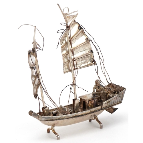 151 - Jack Hing, sterling silver study of a junk in full sail, 8.5cm high, 33.3g