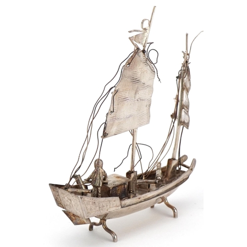 151 - Jack Hing, sterling silver study of a junk in full sail, 8.5cm high, 33.3g