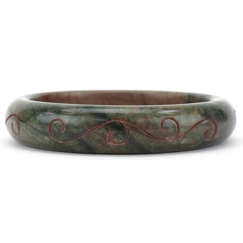 3240 - Chinese green jade bangle, 8cm in diameter, 66.8g