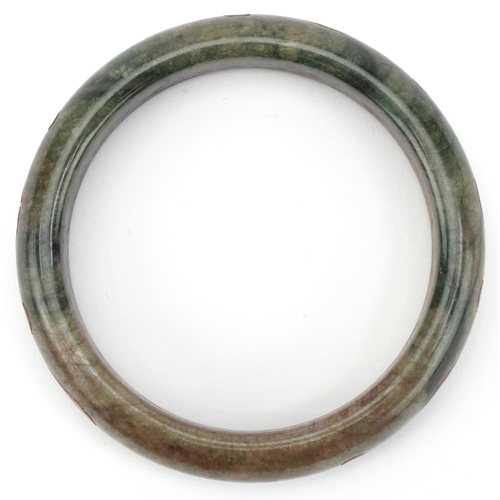 3240 - Chinese green jade bangle, 8cm in diameter, 66.8g