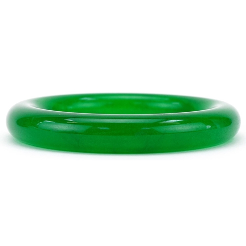 3217 - Chinese green jade bangle, 8.5cm in diameter, 73.4g