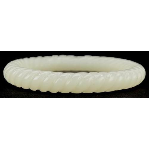 3136 - Chinese jade rope twist design bangle, 8cm in diameter, 42.5g