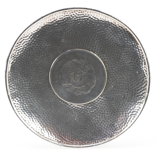 150 - Circular Chinese silver coin design dish, 9.5cm in diameter, 51.2g