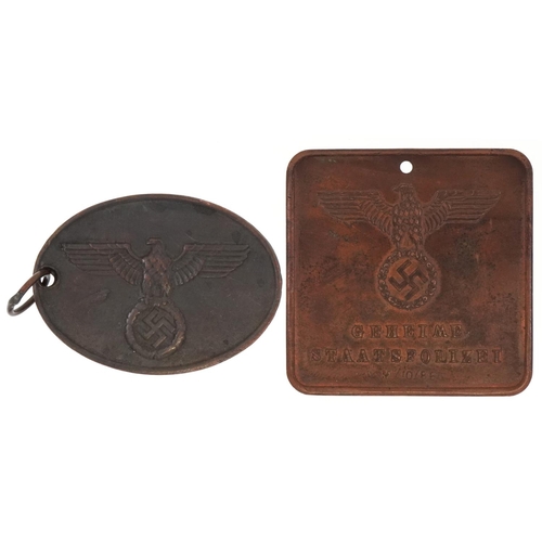 2603 - German military interest dog tag and bronzed plaque