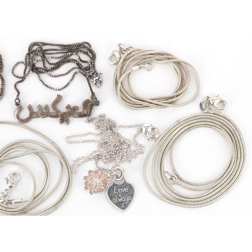 3193 - Seven silver and white metal necklaces, total weight 34.2g