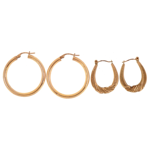 3320 - Two pairs of 9ct gold hoop earrings, the largest 3cm in diameter, total 2.9g