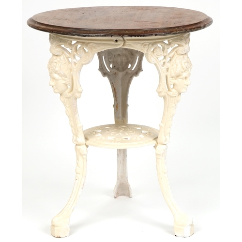 1038 - 20th century white painted cast iron circular pub table with mahogany top, 71cm high x 61cm in diame... 