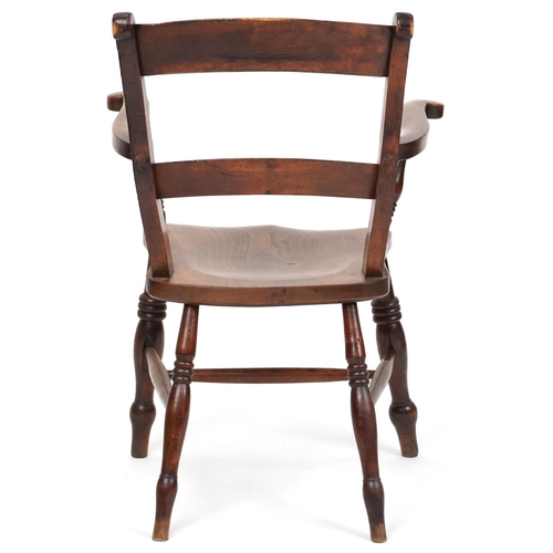 1080 - 19th century beech and elm bar back elbow chair raised on ring turned legs united by stretchers, 92c... 