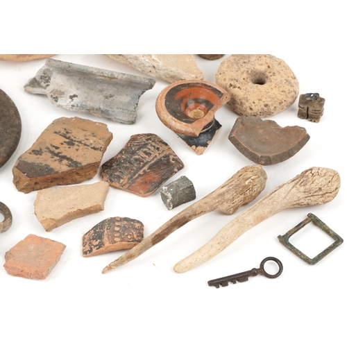 354 - Group of ancient Roman and Greek pottery fragments including weights, tiles and pot fragments