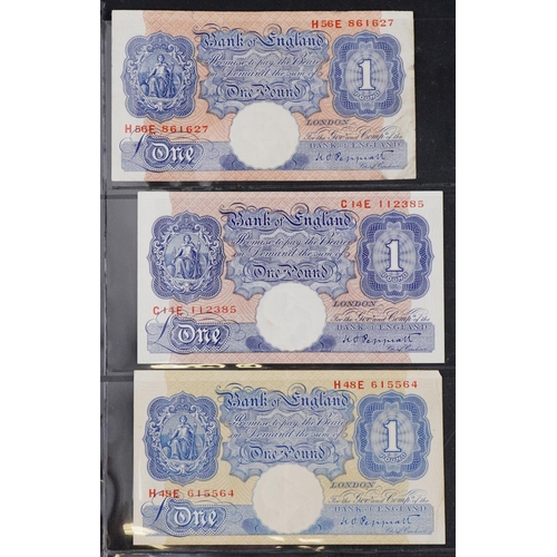 2233 - Vintage British banknotes consisting of nine brown ten shilling notes from the 1940s, three mauve em... 