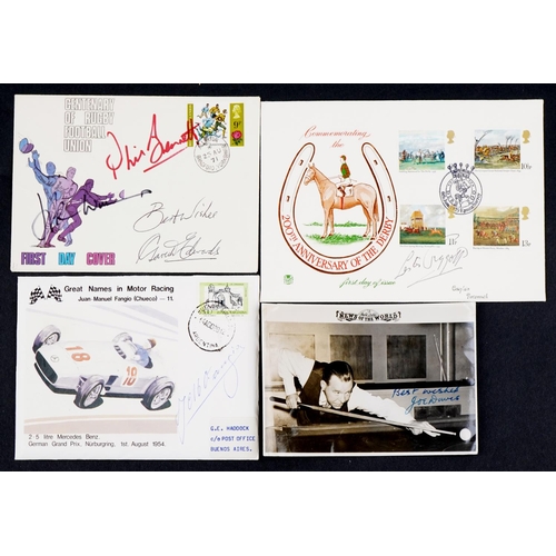 2393 - Three commemorative stamp covers, each signed to include racing driver Juan Manuel Fangio, a Lester ... 