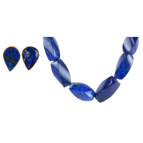 3224 - Pair of unmarked gold lapis lazuli teardrop earrings with screw backs and a polished lapis lazuli be... 