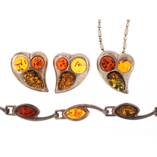 3257 - Silver and amber jewellery suite comprising pendant on chain, bracelet and earrings, the necklace 44... 