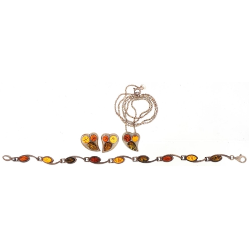 3257 - Silver and amber jewellery suite comprising pendant on chain, bracelet and earrings, the necklace 44... 