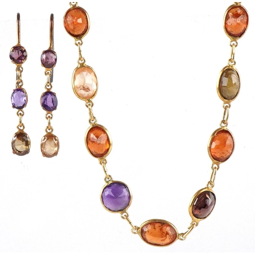 3300 - Yellow metal multi gem necklace and matching earrings set with semi precious stones including garnet... 