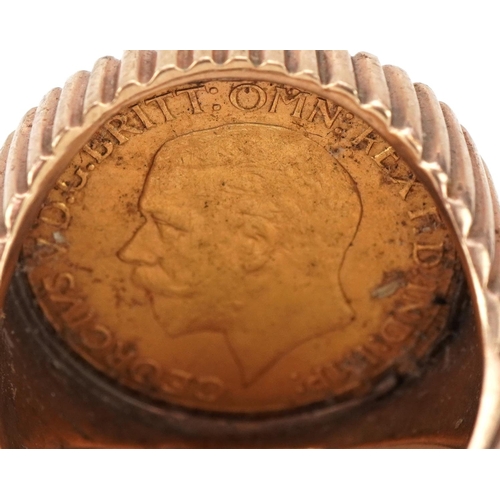 3008 - George V 1929 gold sovereign, South Africa Mint, housed in an unmarked gold ring mount, size U, 17.8... 