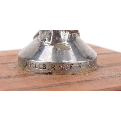 2459 - Rolls Royce Motors Limited cast metal Spirit of Ecstasy mounted on a later square wooden base, overa... 