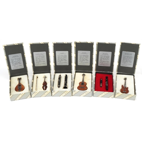 415 - Six miniature Italian sterling silver musical instruments by Sacchetti, the largest 10cm in length