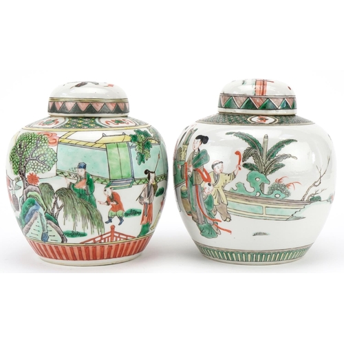 99 - Two Chinese porcelain ginger jars and covers, 20th century, each decorated with figures within lands... 